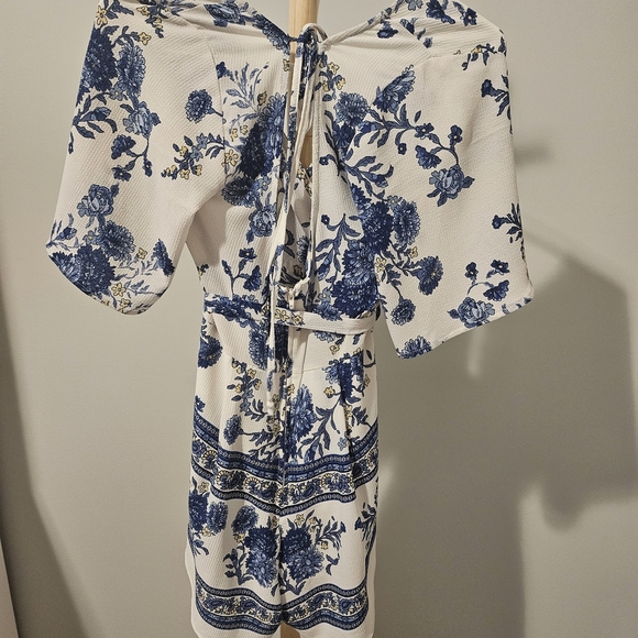 Francesca's Collections Cream Romper with Blue Floral Design - Picture 3 of 4
